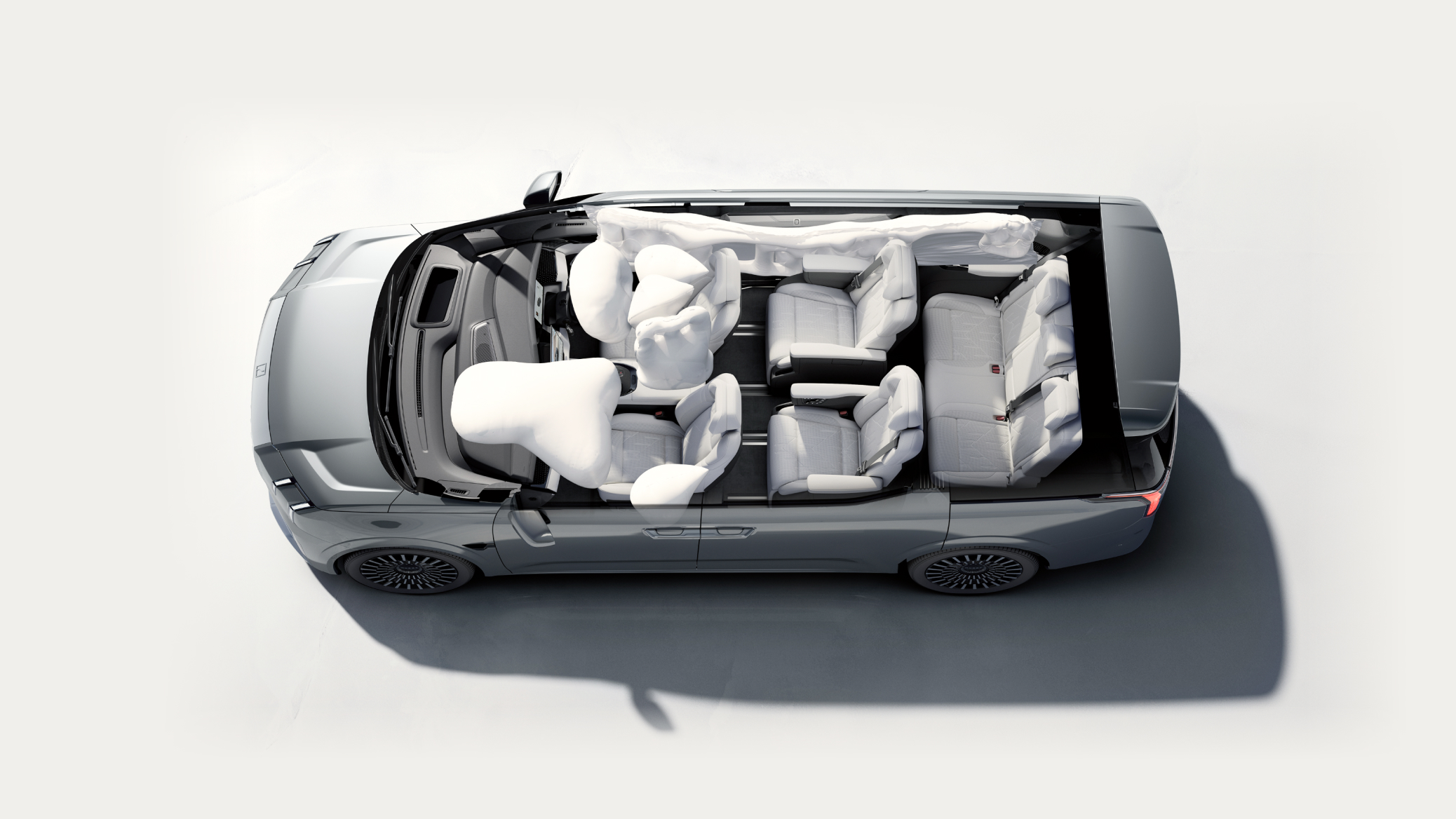 Top-down view of the Zeekr 009 showcasing its advanced 7-airbag system, including front, side, curtain, and centre airbags, ensuring enhanced safety for all passengers.